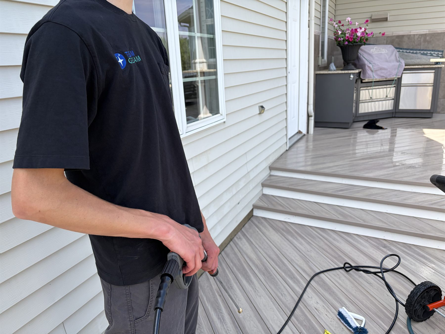 Pressure washing an exterior surface